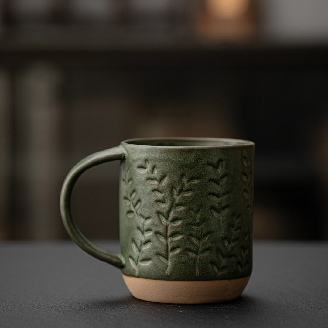 Ceravor small leaf relief green ceramic mug front view