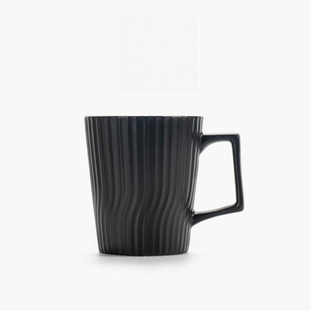 Ceravor black and white ribbed ceramic coffee mugs together