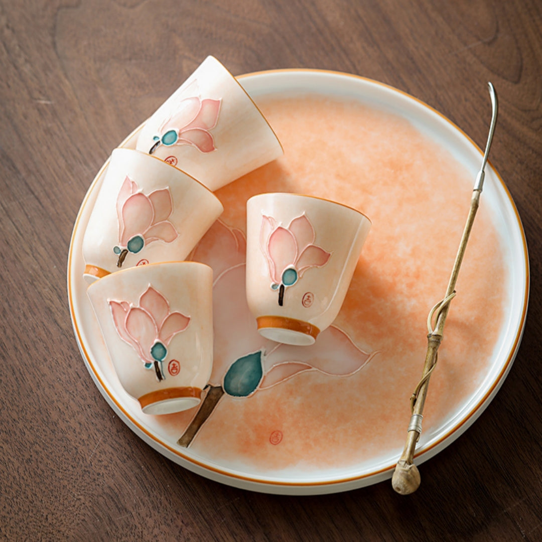 Several Ceravor aroma teacups on a tray with a traditional tea utensil