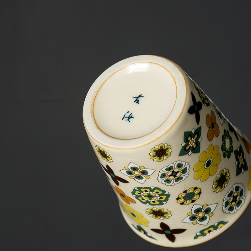 Bottom view of Ceravor retro floral ceramic cup showing signature