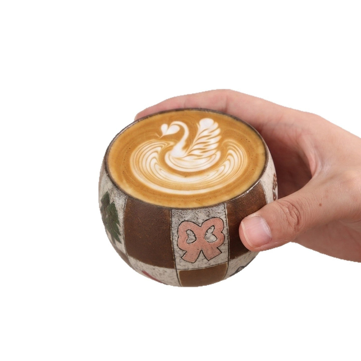 Close-up of Ceravor patchwork cat mug filled with black coffee