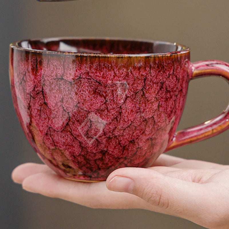 Ceravor crimson mug held in hand showing full exterior