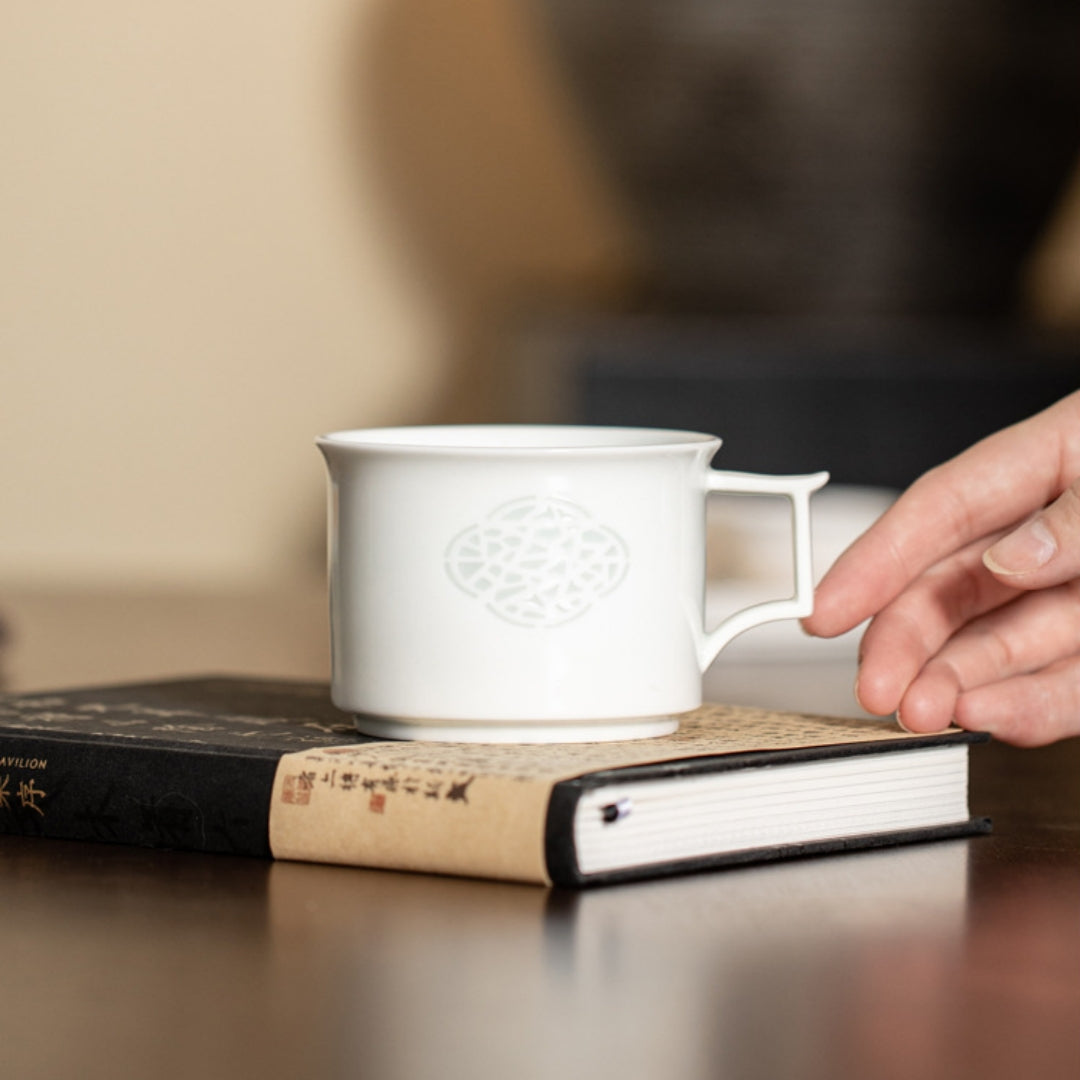 Ceravor starry night ceramic teacup on a dark wooden table