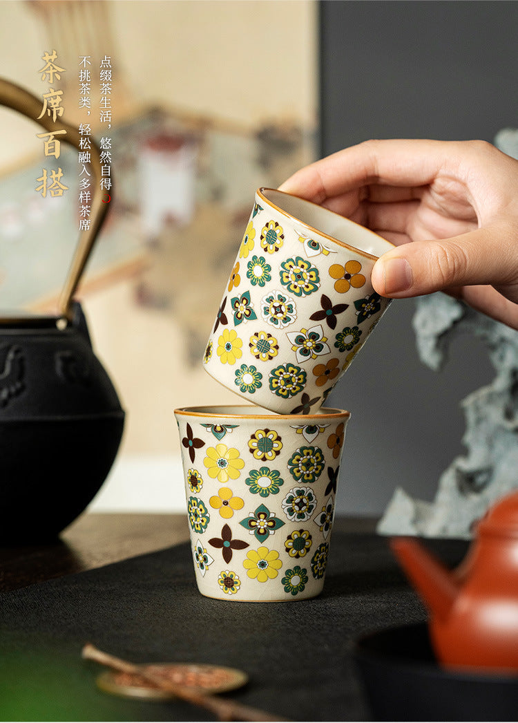 Two Ceravor retro floral ceramic cups stacked