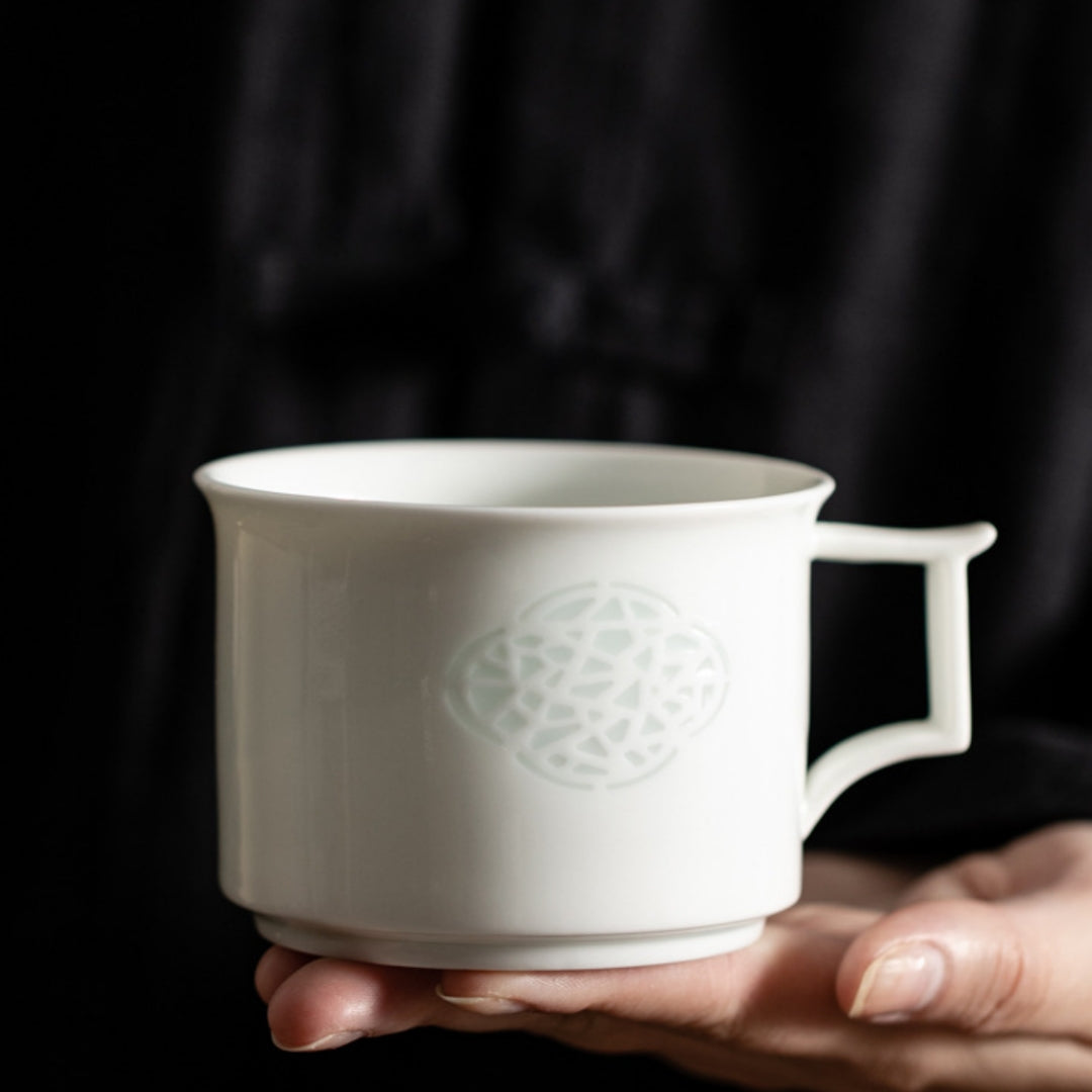 Ceravor handleless teacup with dark exterior and blue interior