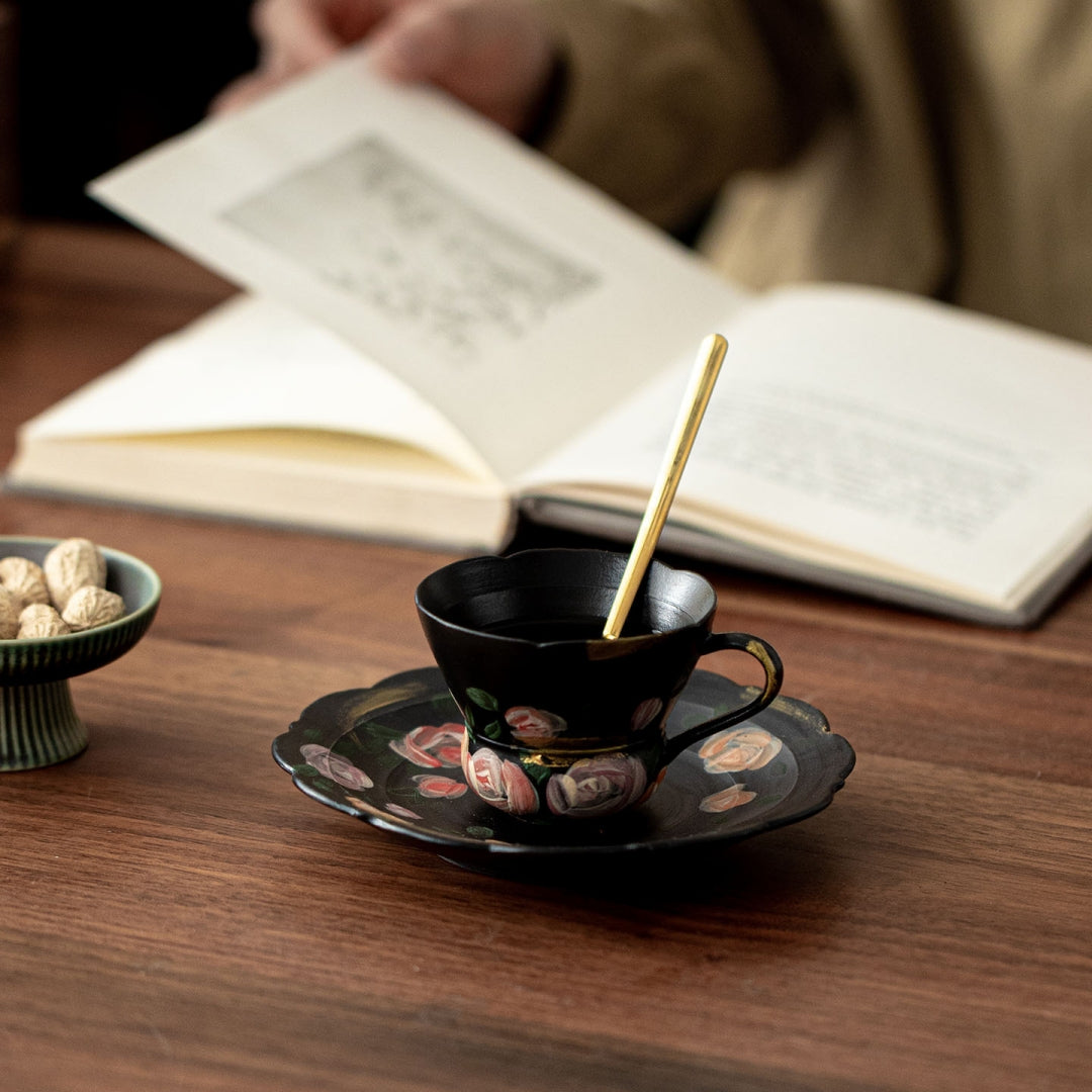 Ceravor black espresso cup and saucer on dark wooden table