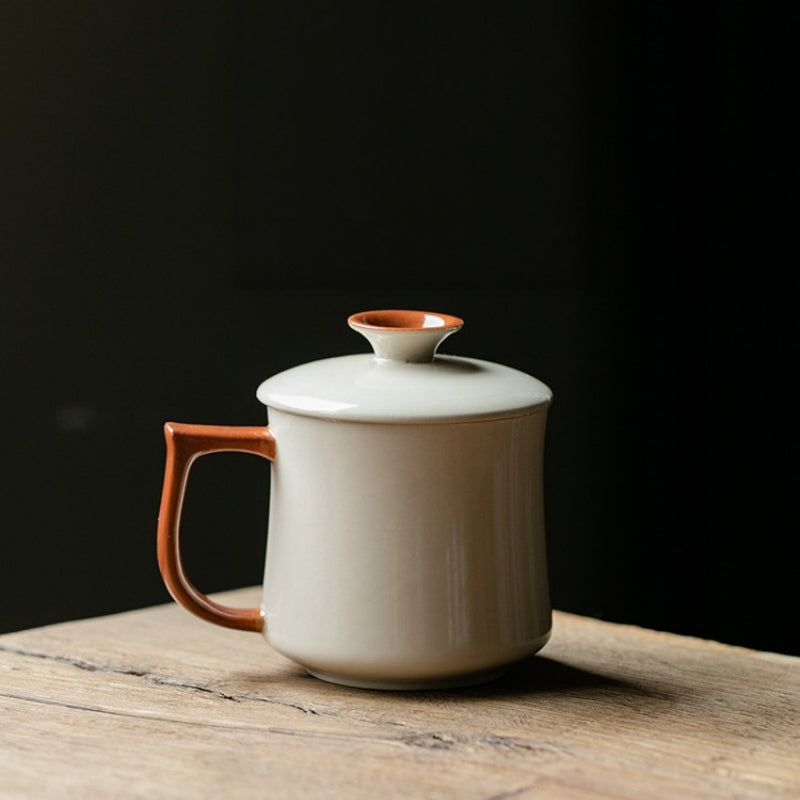 Ceravor ceramic mug and lid displayed with a white gift bag