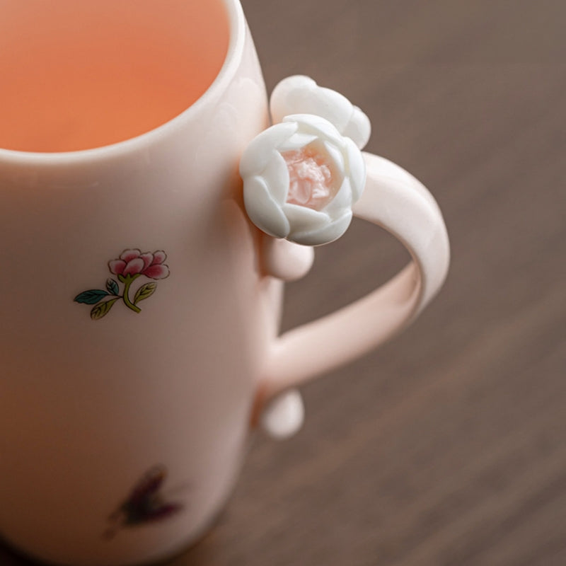Person holding Ceravor Peony Garden pink ceramic mug with both hands